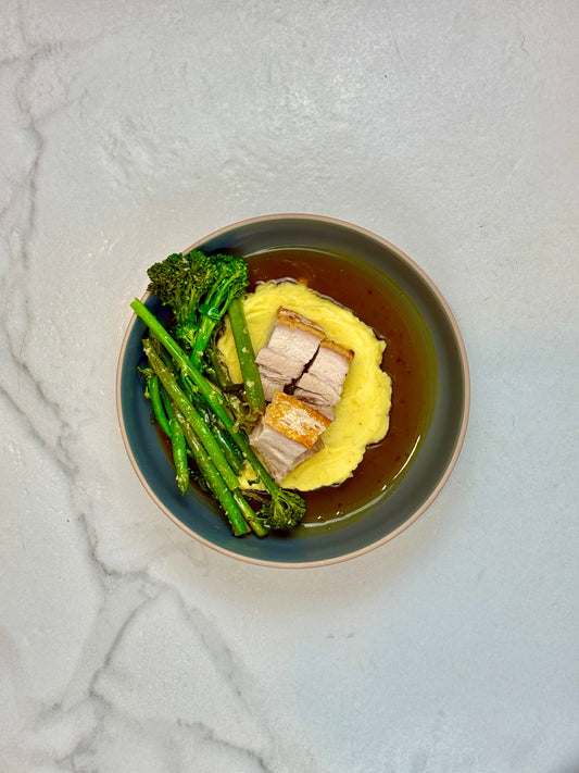 Crispy pork belly, mash & garlic greens