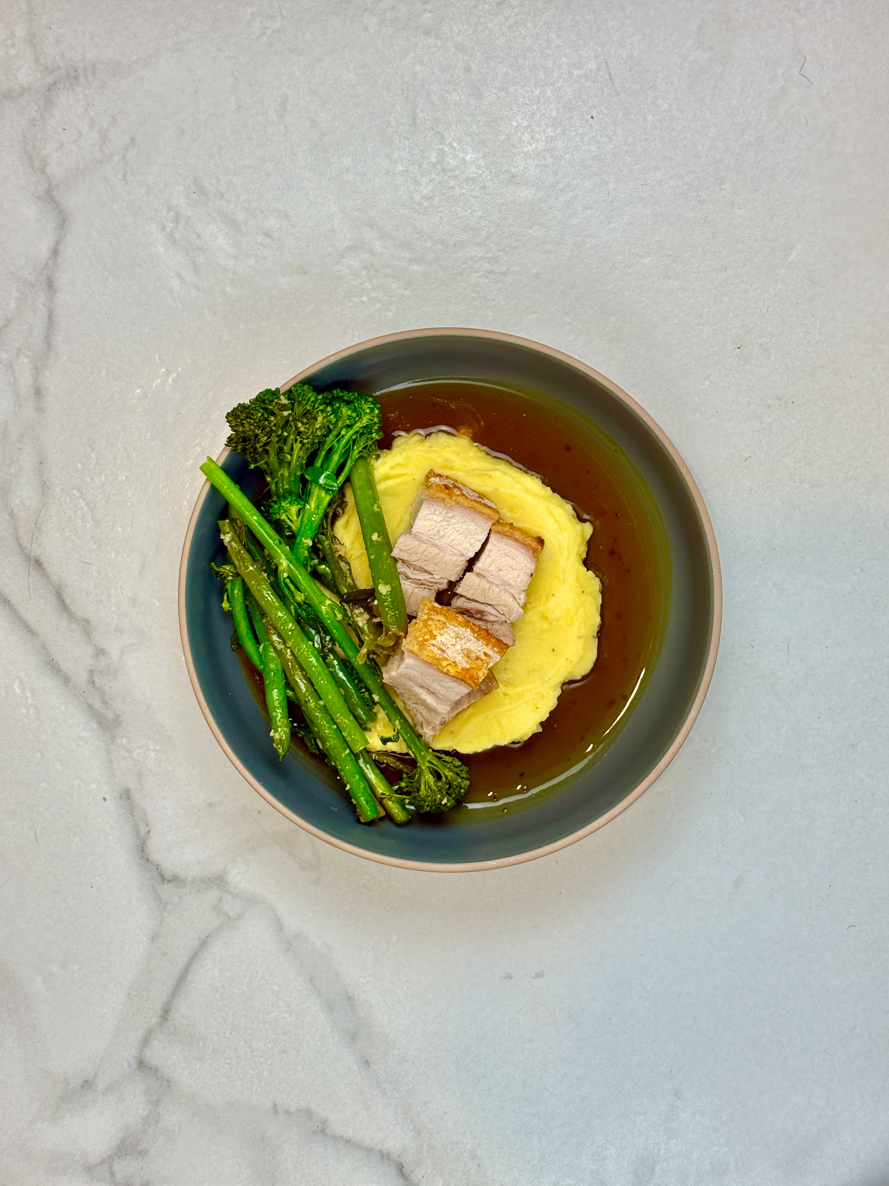 Crispy pork belly, mash & garlic greens