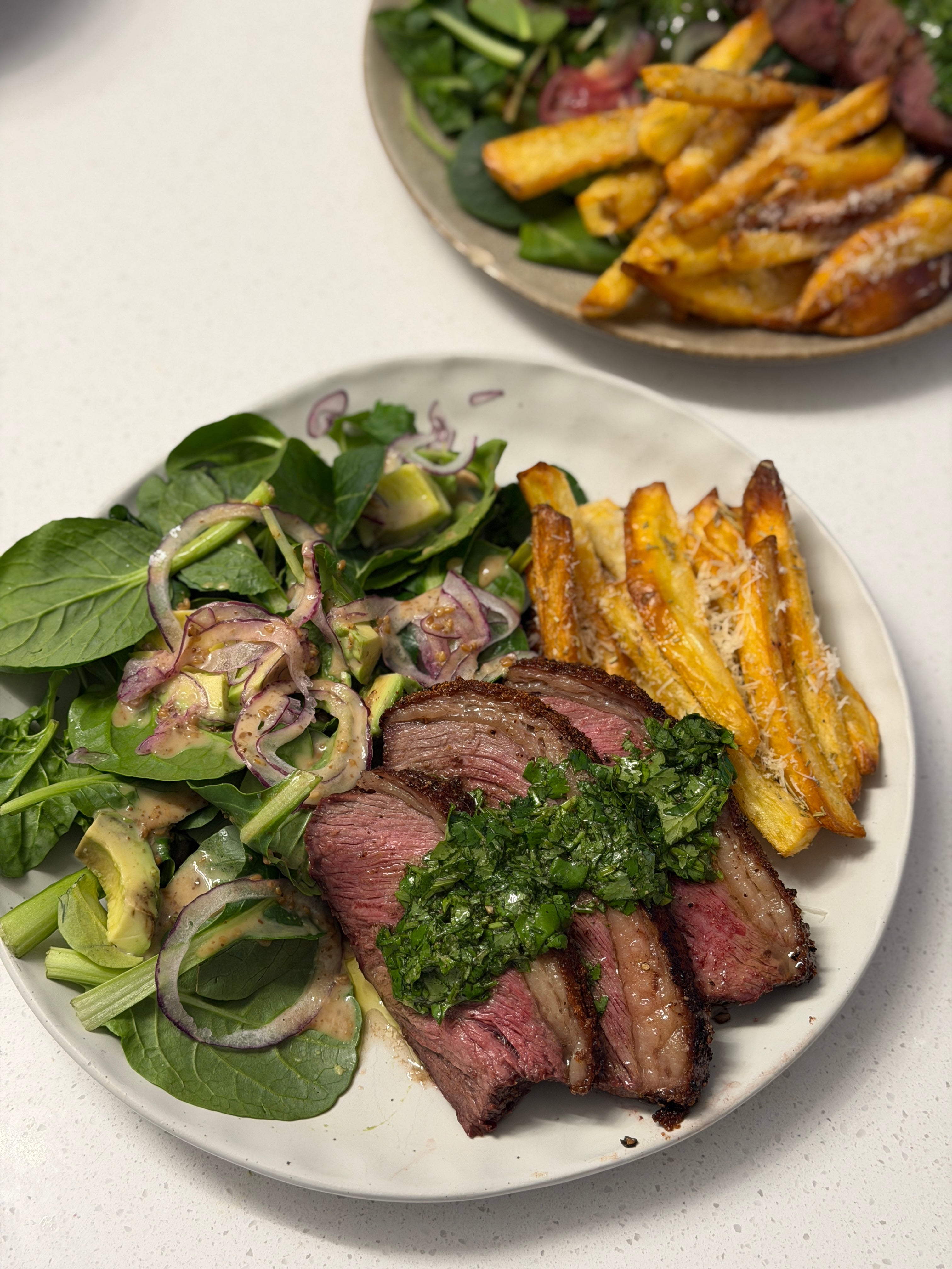 Steak w/ chimichurri, & rosemary fries 