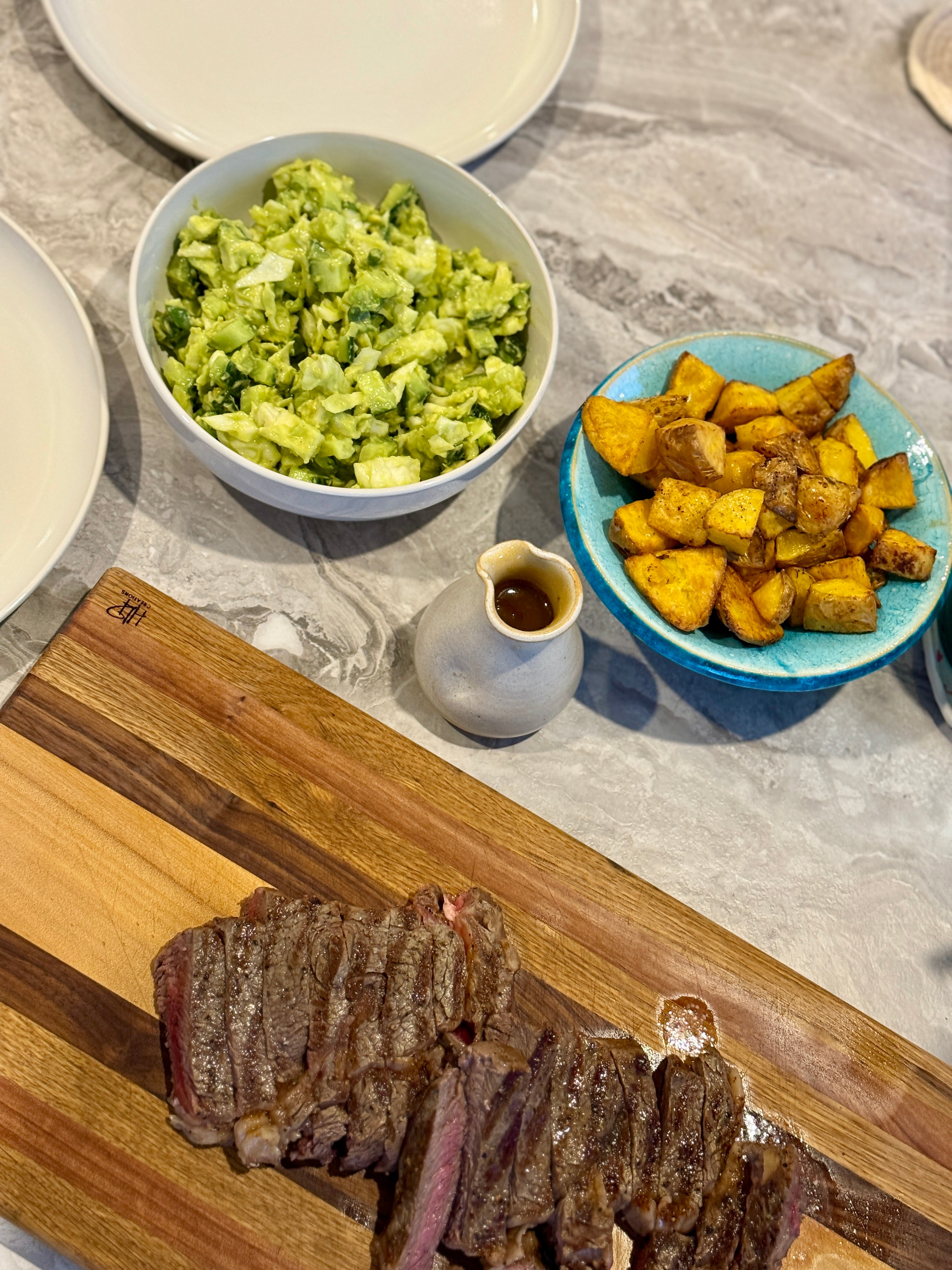 Cucumber & cabbage salad with steak & crispy potatoes 